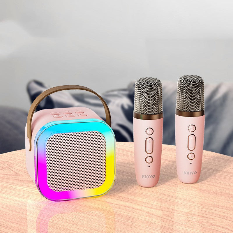 Portable Bluetooth karaoke speaker system with dual wireless mics, RGB lights, and rechargeable design, ideal for party and family entertainment.