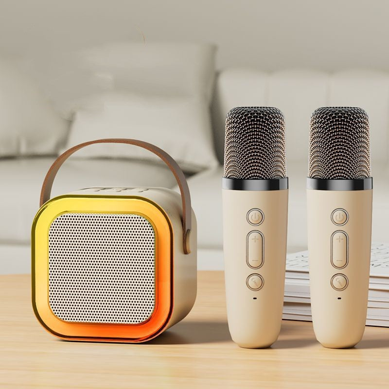 Portable Bluetooth karaoke speaker system with dual wireless mics, RGB lights, and rechargeable design, ideal for party and family entertainment.