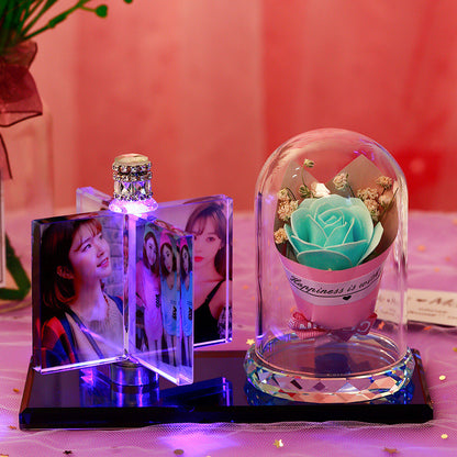 A personalized custom crystal photo frame featuring multiple photo slots and an integrated car perfume diffuser, paired with an adorable unicorn figurine. This unique, elegant display piece from FASHIONARIE CLUB serves as the perfect decorative accessory for car interiors or office desks, combining style, fragrance, and cherished memories in one premium, high-quality product.