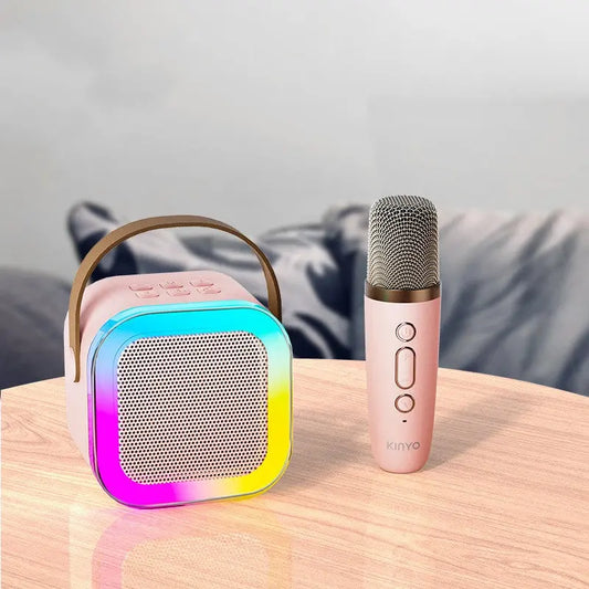 Portable Bluetooth karaoke speaker system with dual wireless mics, RGB lights, and rechargeable design, ideal for party and family entertainment.
