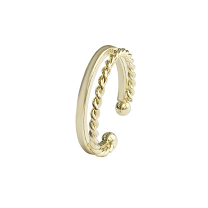 Elegant adjustable geometric double-layer gold ring with a twisted stripe design, crafted from premium copper, displayed on a soft aesthetic fabric background.