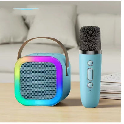 Portable Bluetooth karaoke speaker system with dual wireless mics, RGB lights, and rechargeable design, ideal for party and family entertainment.