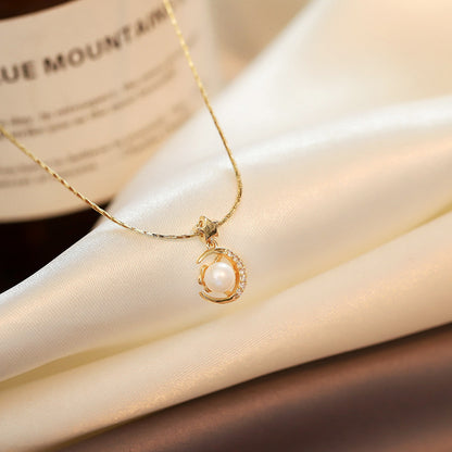 Close-up of an elegant gold floral-shaped geometric necklace with sparkling crystals, displayed on a dark surface for a luxury fashion look.