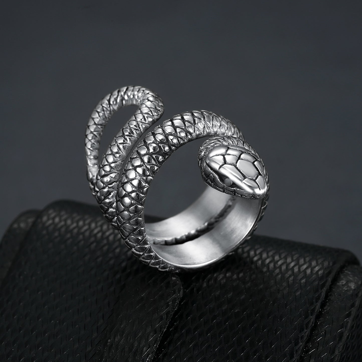 Close-up of a durable titanium steel men's ring featuring an intricate snake-shaped design, perfect for bold fashion and gothic-style accessories in the UAE.